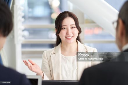 Asian business woman explaining at a meeting