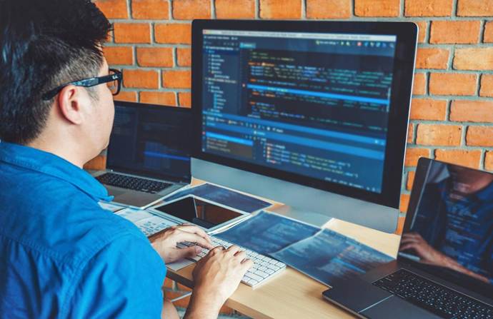 System Development Engineer Recruitment - The system development engineer is checking the system code