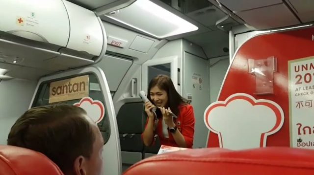 AirAsia Stewardess Entertained Passengers During A Flight Delay ...